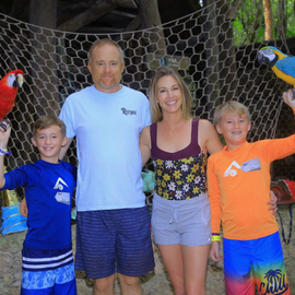 Family Photo with Colorful Parrots Featuring Erin Scholtes